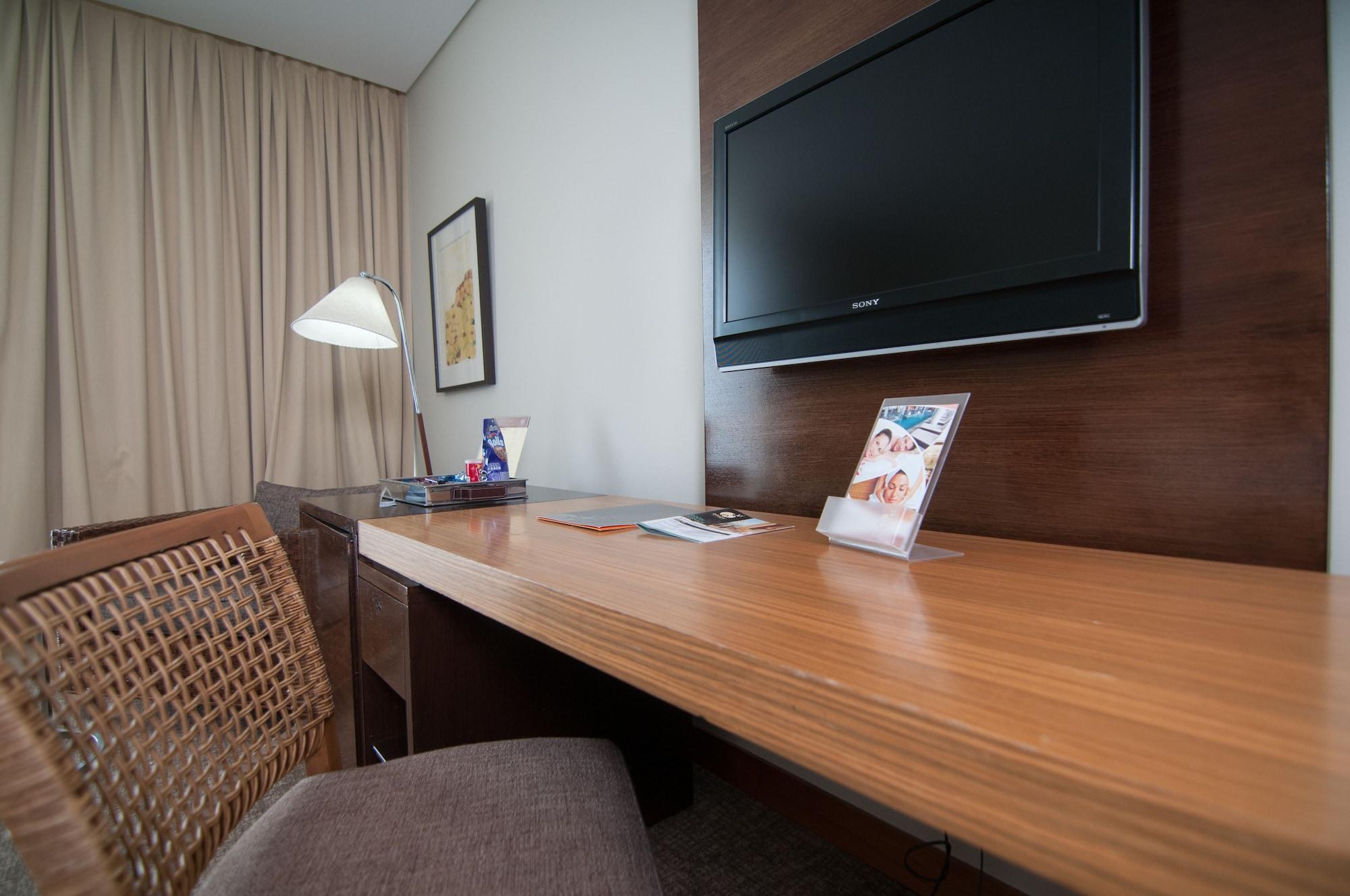 Enjoy Coquimbo Hotel Ngoại thất bức ảnh A television in a hotel room